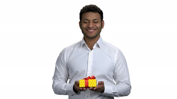 Happy Africanamerican Businessman Offering Gift Box alt
