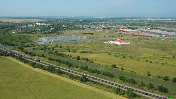 Aerial View, Road Junction, Highway. Country Road, Production Facilities and Warehouses. Russia