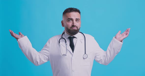 Incompetent Medical Doctor Spreading His Hands, Blue Background alt
