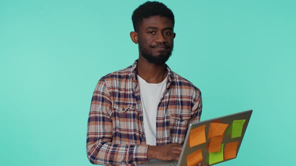 Exhausted Man Freelancer with Pasted Sticker Notes Using Laptop Computer Concentration Problem alt