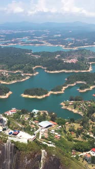 Aerial Vertical View Guatape and it's Surrounding Lake from Rock of Guatape alt