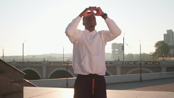 Man Stretching His Back At Workout alt