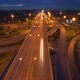 Aerial view shot of fast moving above interchange and multi junction road - VideoHive Item for Sale