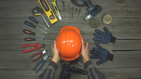 Variety of Electro and hand Tools, safety Helmet and Gloves.