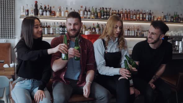 Four Interracial Friends at the Bar Stay alt