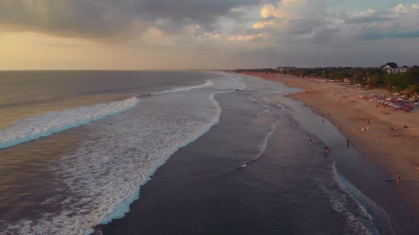 Flight at Sunset Overlooking the Indian Ocean in Bali Indonesia alt