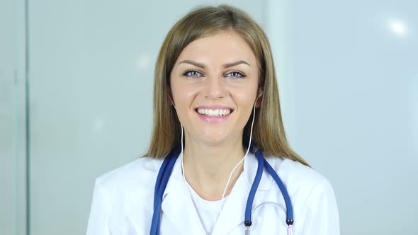 Close Up of Female Doctor Doing Video Chat, Webcam View alt
