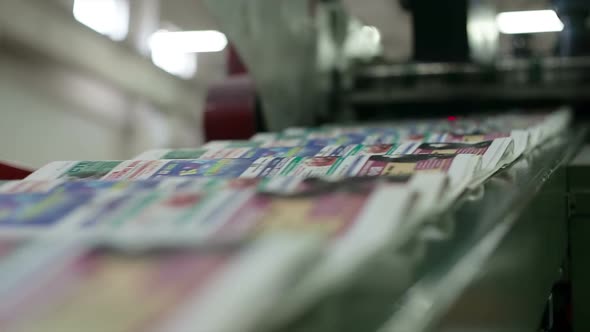 Optical Controller Counts the Number of Newspapers on Line alt