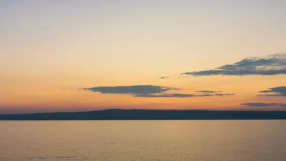 Time lapse ocean beach sunset sky alt