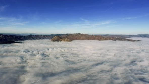 Drone footage of the city under the fog