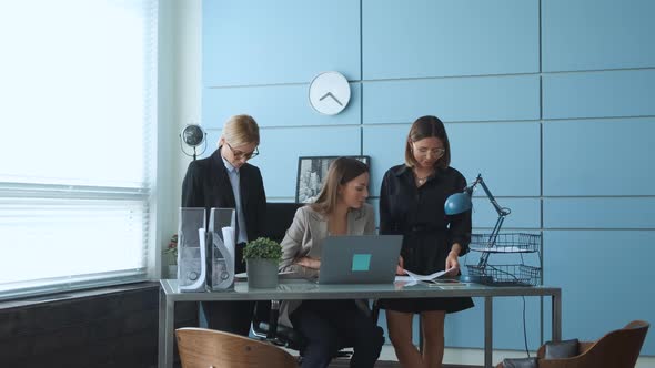 Happy multiracial diverse students or coworkers team study work together share table alt