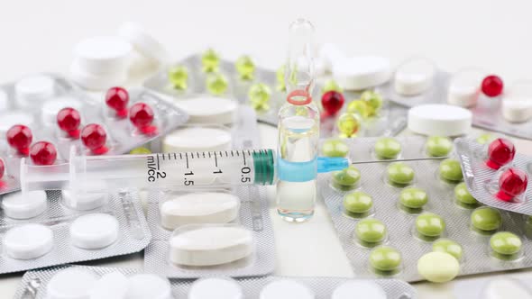 Multi-Colored Pills and Capsules Lie on The Table