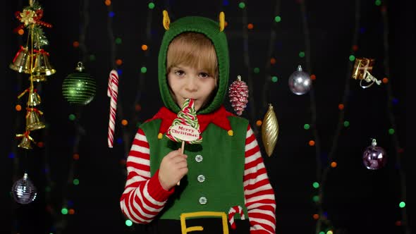 Kid Girl Christmas Elf Santa Claus Helper Costume Licking Candy Lollipop Caramel Sweets alt