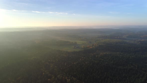 Aerial View of Idyllic Landscape at Misty Sunrise