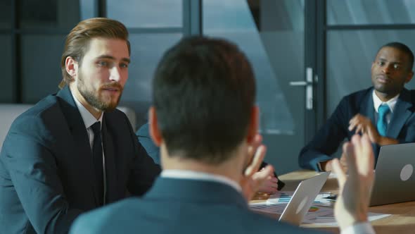 Corporate business team in a meeting with a manager alt