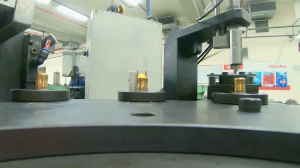 Advanced robotic machine manufacturing parts in an automated assembly line alt