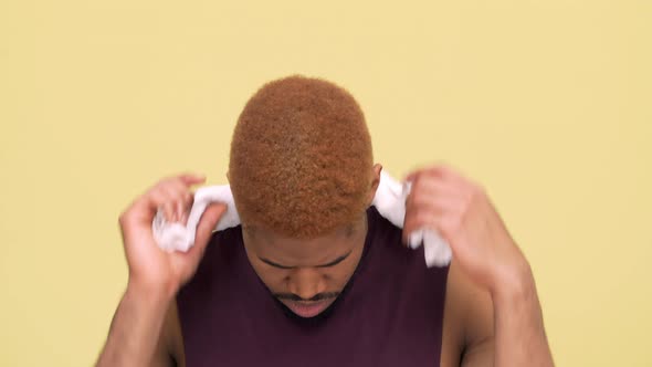 Sporty Metis Guy with Stylish Haircut Wearing Workout Clothes Taking Break After Training Putting alt