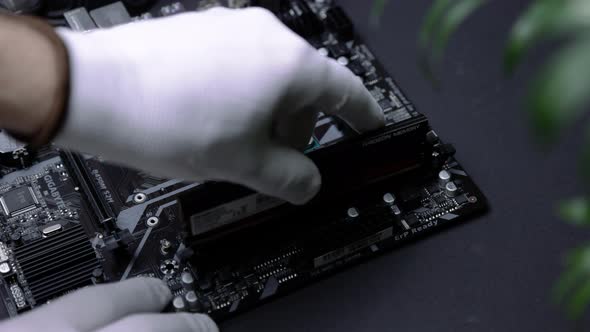 RAM on the motherboard with the processor CPU. assembling a computer alt