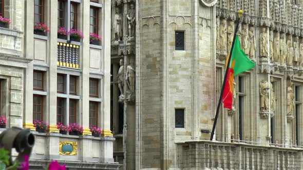 Flag of the City of Brussels at the Brussels Town Hall building, Grand Place, Belgium.
