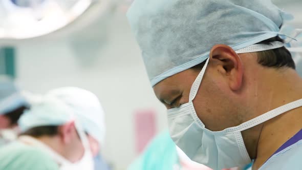 Male  experienced surgeon in operation room