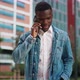 Black Man Speaking on Smartphone in City - VideoHive Item for Sale