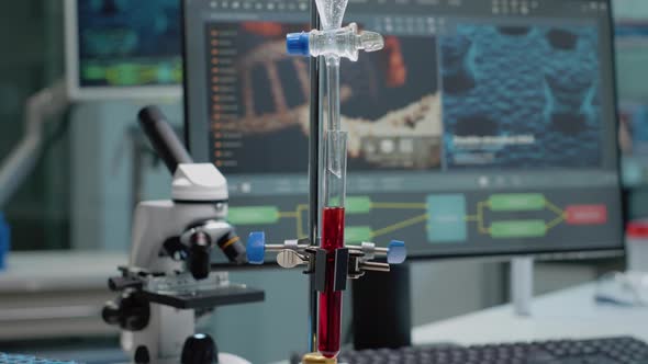 Close Up of Test Tube and Pipe for Mixing Solutions in Laboratory alt