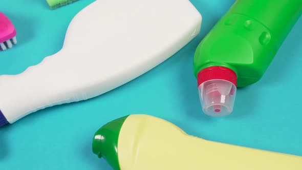 Top View of Bright Bottles of Household Chemicals and Cleaning Items