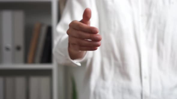 Handshake Girl Gives A Hand. Close Up Hand Of A Man Holding Out His Hand With The Aim Of Getting alt