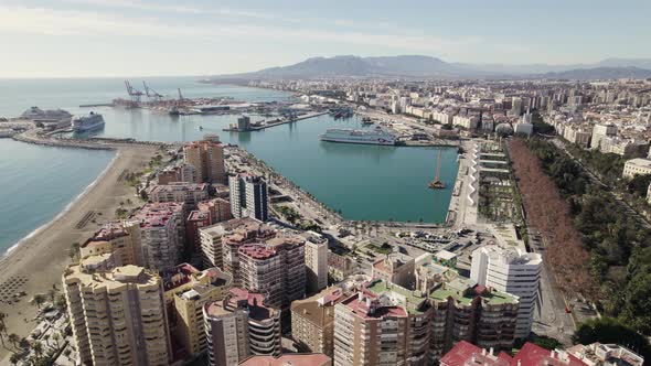 High-rise buildings of La Malagueta central seafront district and port; aerial