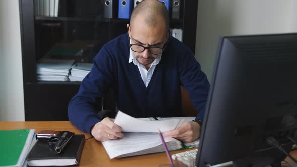 The Investigator in the Office Working with Criminal Cases alt