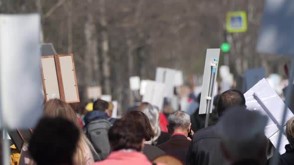 Crowd Person Walking Down Street Europe with Banners Defending Their Rights alt