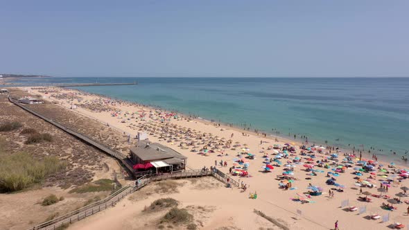 Aerial Video Beautiful Portuguese Beaches Near the Tourist Town Vilamoura Falesia with a View of the alt