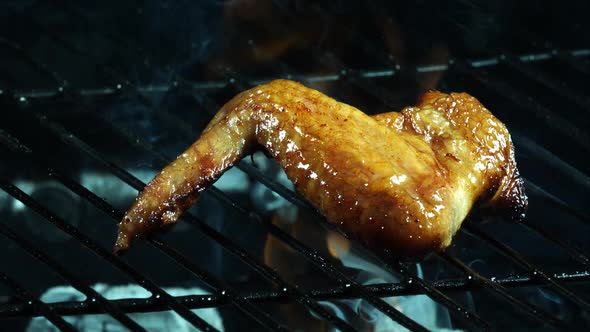 Grilling BBQ Chicken Wings in ultra slow motion  alt