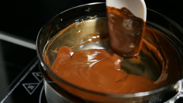 a Pastry Chef Melts Chocolate in a Steaming Pan