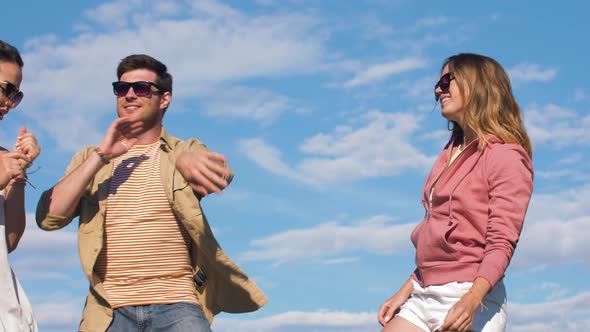 Happy Friends Dancing at Summer Party Outdoors 47 alt