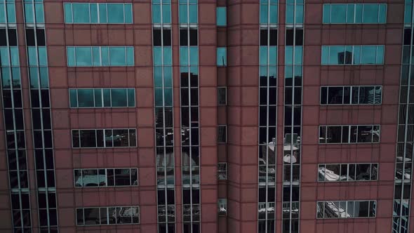 cinematic tilting down on chicago  streets, lake and a boat 4k alt