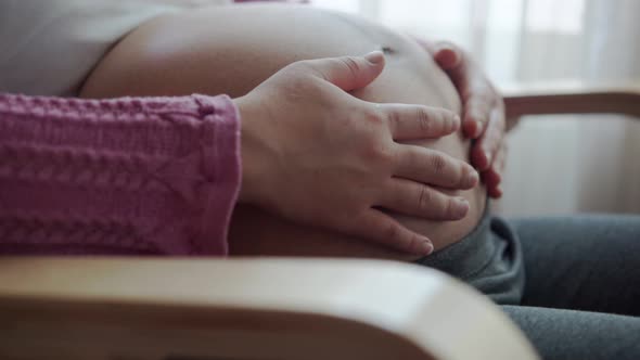 Happy Pregnant Woman and Expecting Baby at Home alt