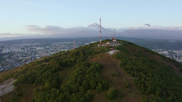 Telecommunications Tower with Volcanoes in the Background Petropavlovsk Kamchatsky
