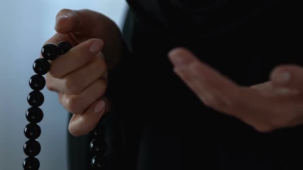 Muslim Lady Praying With Islamic Beads in Hand, Allah Faith Religious Meditation alt