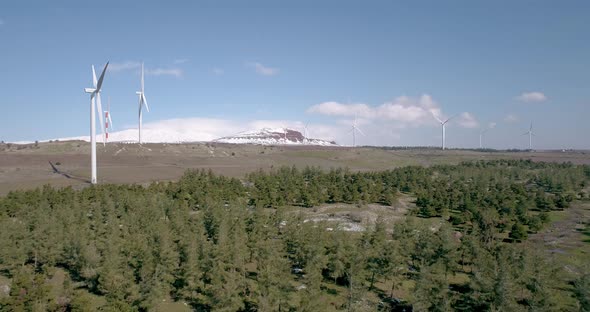Aerial view of wind turbine farm near a vineyard, Golan Heights, Israel. alt