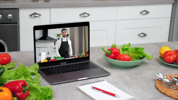 Laptop Computer with Man Chef Food Blogger Tells Teaches Housewife Students alt