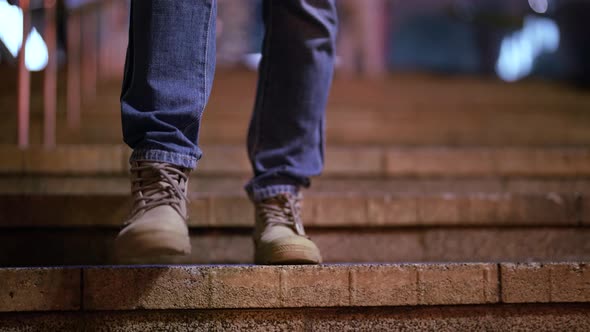 Casually Dressed Woman is Walking in City in Evening or Night Closeup of Feet on Stairs alt