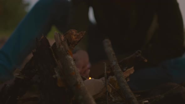 Young Couple Near Romantic Campfire Hiking Date