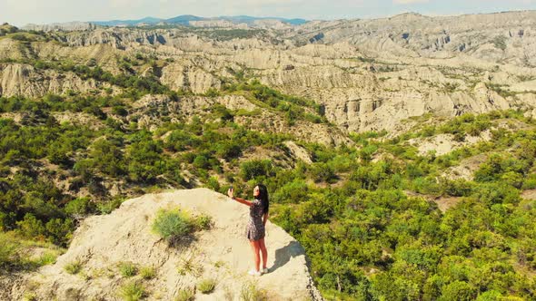 Beautiful Woman Pose For Social Media In Scenic Location alt