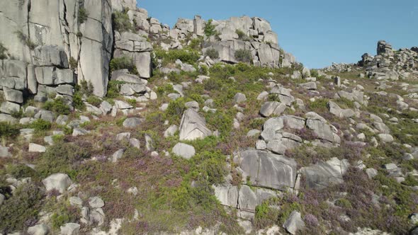 Aerial backwards view of rocks in National Park Geres. Portugal. Real time