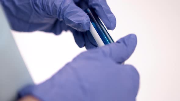 Doctor Collects Nasopharyngeal Swab From Patient with Coronavirus Infection alt