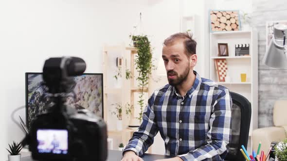 Worried Famous Influencer Recording a New Vlog alt