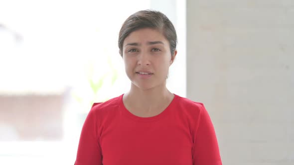 Portrait of Indian Woman Shaking Head As No Sign alt