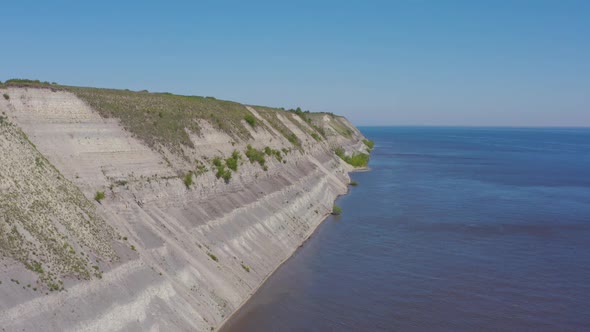 Steep Bank of the River From a Bird's Eye View. Bank of the Volga River in Russia. Aero  alt