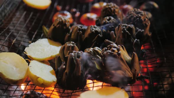 Grilled Artichokes Traditional Medieval Barbecue Grilled Artichokes BBQ Medieval Style Fried Food alt